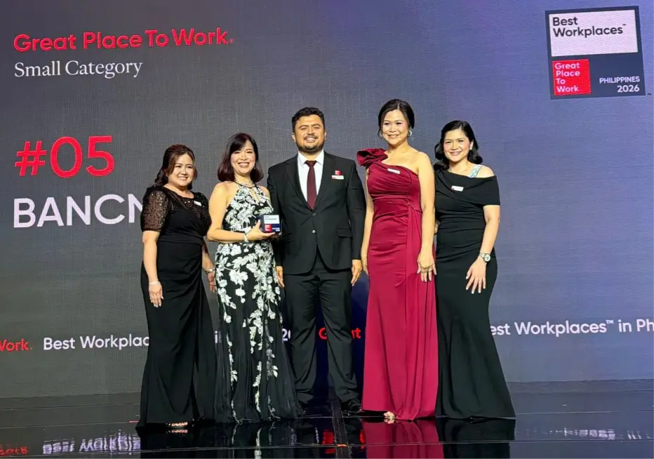 BancNet CEO Emmie Reyes and members of the Human Resources and Admin Division (HRAD) receive the Best Workplaces™ Philippines 2026 award. From left: Belle Lobitana (BancNet Talent & Organization Development Officer), Emmie Reyes (BancNet CEO), Charles Plumley (Great Place to Work Philippines General Manager), Polly Austria (BancNet HRAD Head) and Jao Burgos (BancNet HR Officer).